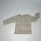 Maglia a righe beige e grigie per bambini con maniche lunghe.